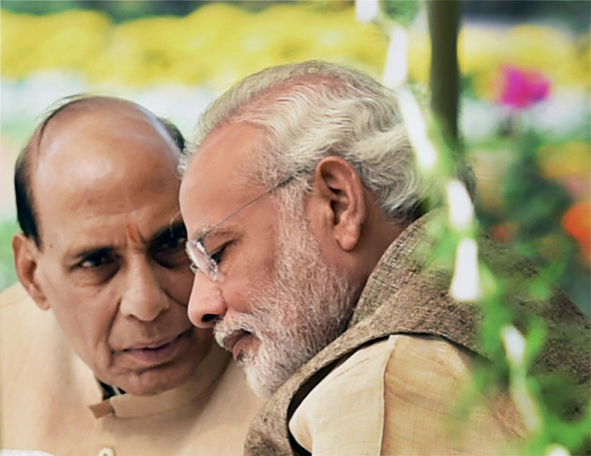Union Home Minister Rajnath Singh and Prime Minister Narendra Modi during a lunch hosted for the Governors attending the 46th Governors Conference, at the Rashtrapati Bhavan in New Delhi, Feb. 12. (Subhav Shukla | PTI)