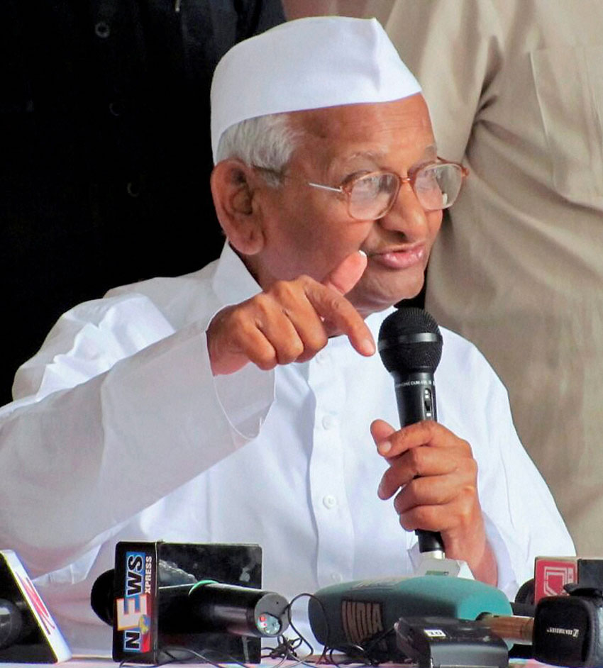 Veteran leader Anna Hazare addresses the media in Ralegan Siddhi, Feb. 10. (Press Trust of India)