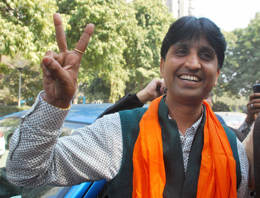 AAP leader Kumar Vishwas arrives at the party office in Kaushambi, Feb. 10, after the party's win in Delhi Assembly polls. (Press Trust of India)