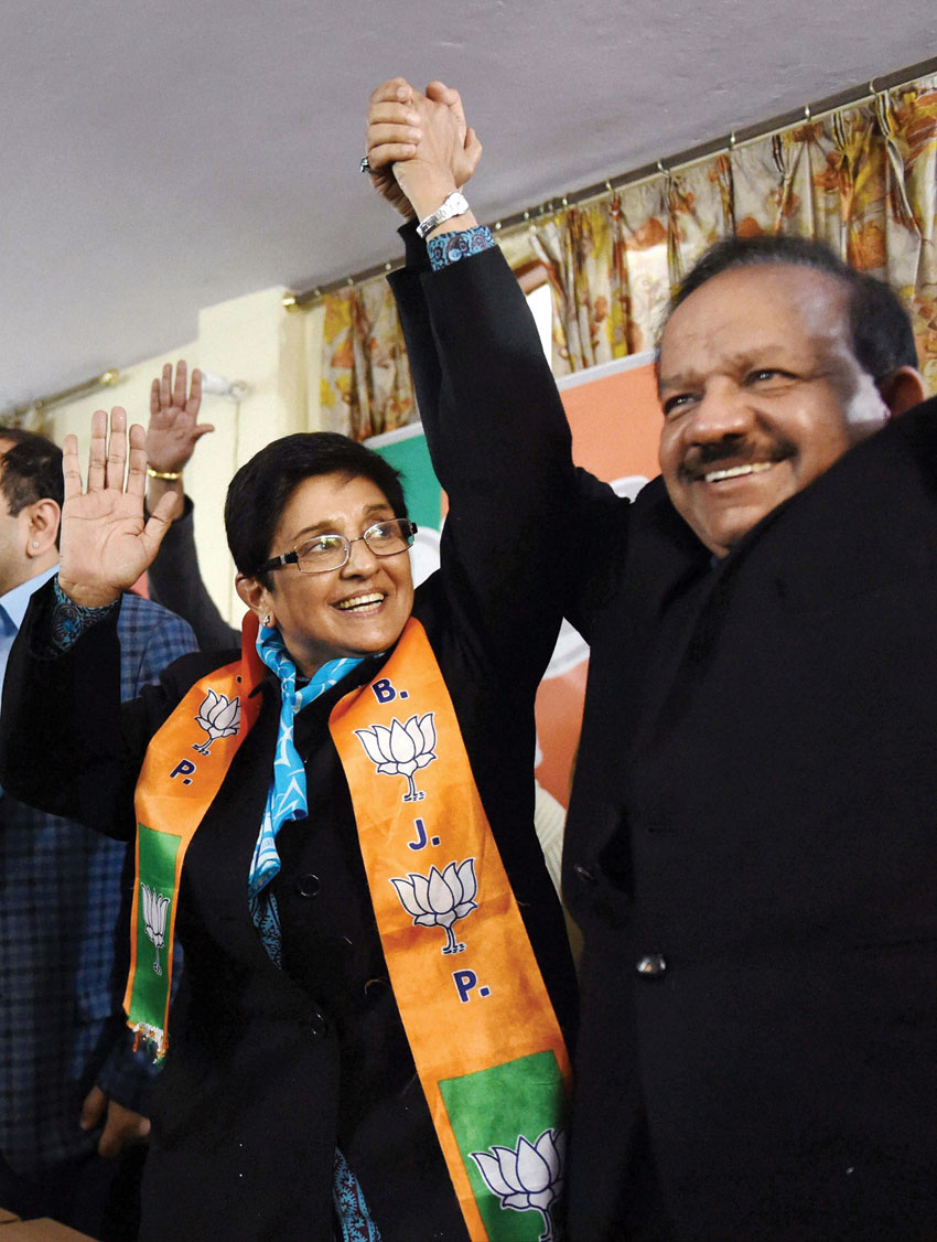 BJP Chief Minister candidate Kiran Bedi with Science and Technology minister Harsh Vardhan at an election campaign in Krishna Nagar area in New Delhi, Jan. 20. (Atul Yadav | PTI)