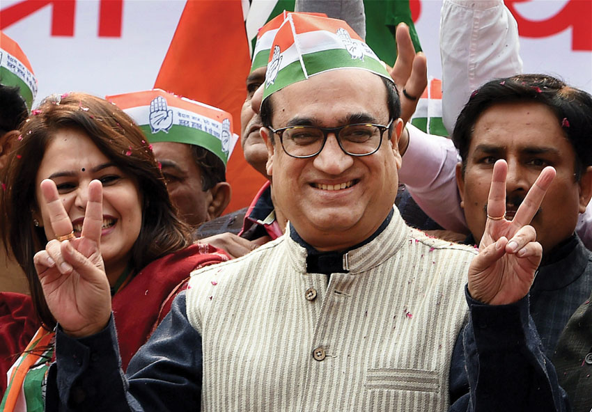 Congress candidate from Sadar Bazar, Ajay Maken, seen with his supporters at his nomination filing procession for Assembly elections, in New Delhi, Jan. 21. (Shahbaz Khan | PTI)