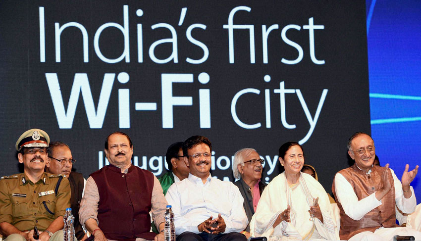 FREE TO ROAM: West Bengal Chief Minister Mamata Banerjee with Finance Minister Amit Mitra, Police Commissioner Surajit Kar Purkayastha and others during inuguaration of first Wi-Fi City in Kolkata, Feb. 5. (Ashok Bhaumik | PTI)