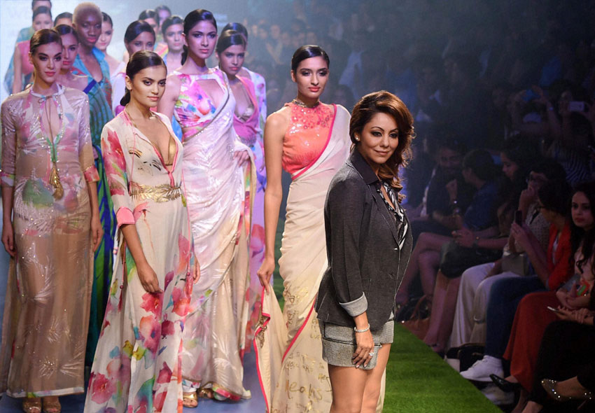 Gouri Khan, designer and wife of bollywood actor Shah Rukh Khan, with models during her show at the Lakme´ Fashion Week Summer Resort 2015 in Mumbai. (Shashank Parade | PTI)