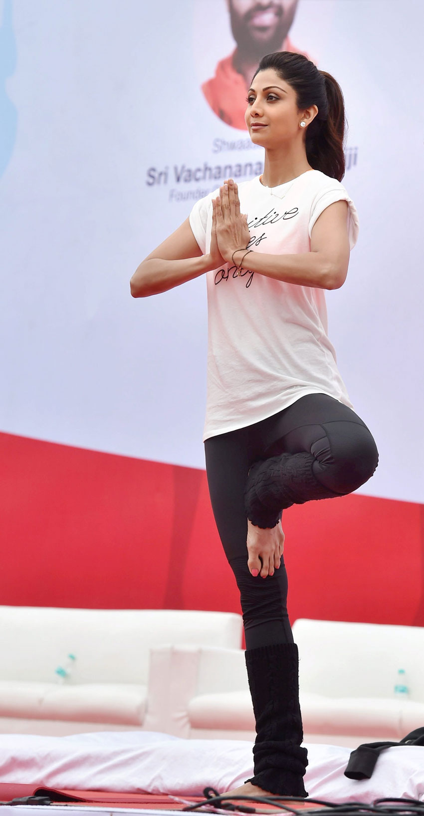 Shilpa Shetty Kundra performs yoga at a mass yoga session to celebrate the 1st International Yoga Day in Bengaluru, June 21. (Shailendra Bhojak | PTI)