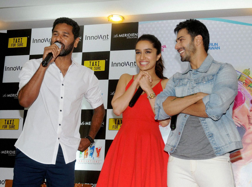 Director Prabhu Deva, Shradha Kapoor (c) and Varun Dhawan (r), promoting their new movie “ABCD 2” in Bengaluru, Jun. 13. (Press Trust of India)