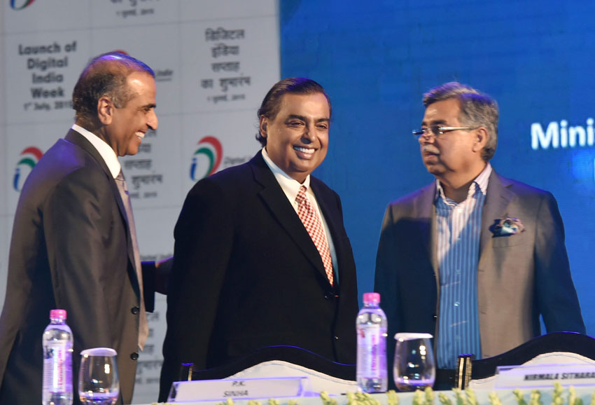 RIL chairman Mukesh Ambani, Bharti Enterprises chairman Sunil Mittal and Hero MotoCorp chairman Pawan Munjal at the launch of Digital India Week in New Delh, July 1. (Kamal Singh | PTI)