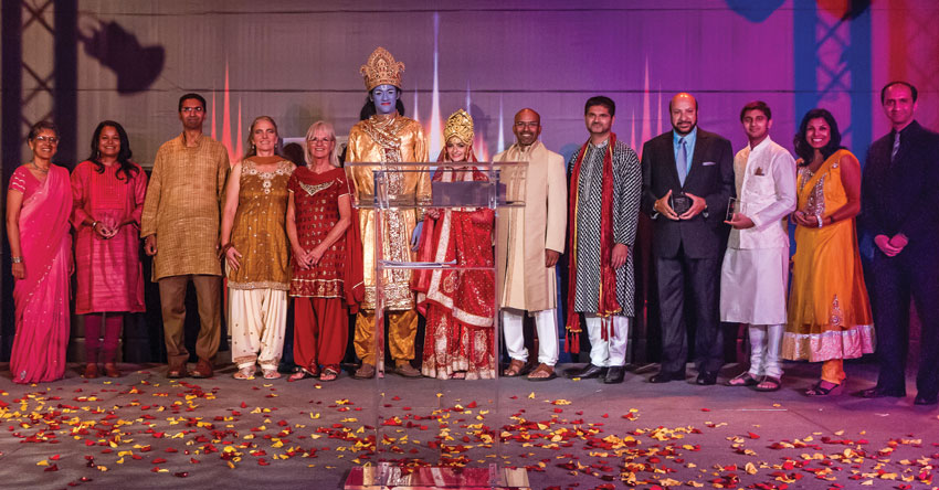 In addition to the entertainment, Incredible India had the opportunity to honor Indian Americans doing something incredible.  The five Outstanding Achievement award winners were; Saagar Gupta (3rd from r), Dr. Lipi Roy (2nd from r), Ray Walia (4th from r), Shalini Nataraj (2nd from l), Mount Madonna School’s Ramayana accepted by co-producers Nicole Tervalon and Anurag Christine White (4th and 5th from l) along with “Lord Ram” and “Princess Sita” characters. (Preston Merchant) 