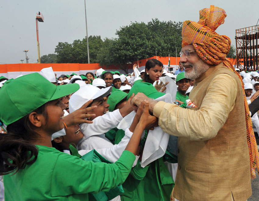 Prime Minister Modi interacting with school children after his address to the Nation at the Red Fort, in Delhi, Aug. 15. (Press Information Bureau) 