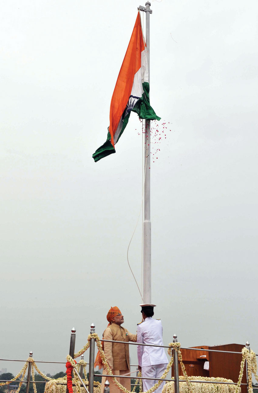 Prime Minister Narendra Modi unfurling the Tricolor flag at the ramparts of Red Fort, on India’s 69th Independence Day, in Delhi, Aug. 15. (Press Information Bureau) 