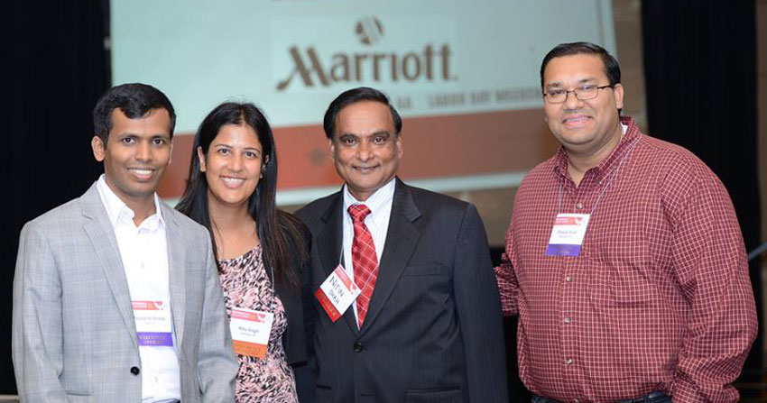 NetIP NA 2014 executive team members Manjesh Reddy, Ritu Singh, and Dhaval Shah with Fast Pitch Competition Judge Nitin Shah at the 2014 Annual NetIP NA Conference in Atlanta, GA. (ByteGraph Productions) 