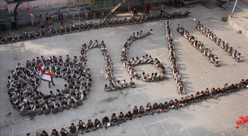 School children make a formation that reads “26/11” to pay their tributes to the victims of Mumbai terror attacks in Jammu, Nov. 26. (Press Trust of India) 