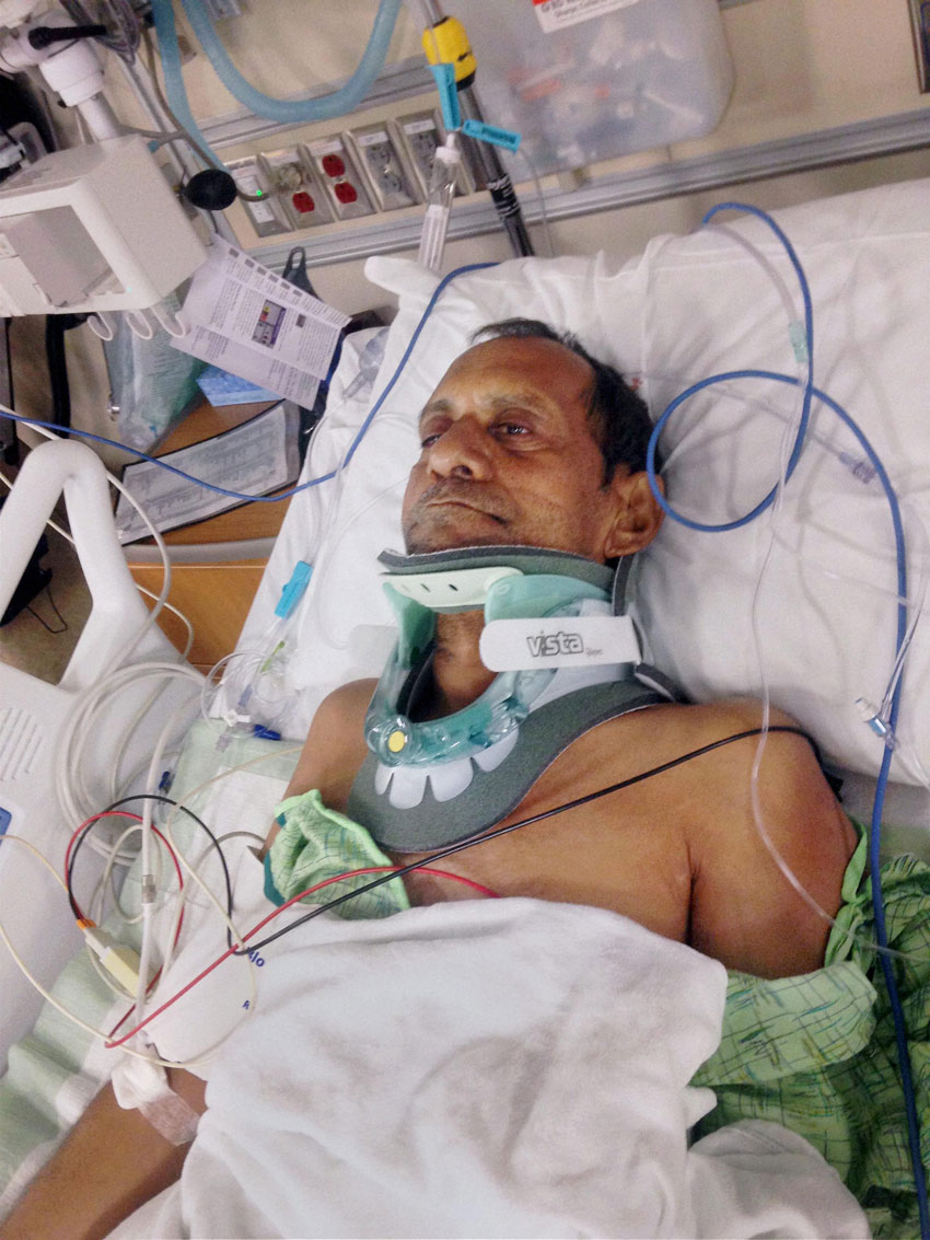 File photo of Sureshbhai Patel, who was paralyzed after a police officer violently frisked him and pulled him to the ground in Madison, Alabama, in February of last year, at the hospital. (Press Trust of India) 
