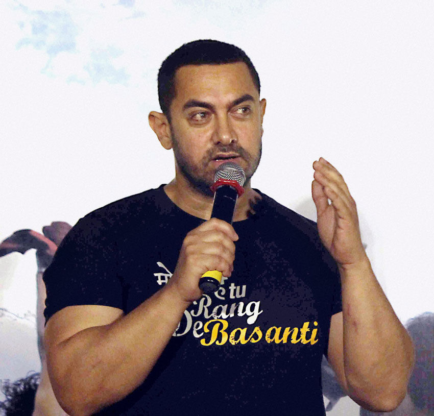 Aamir Khan addresses a press conference to commemorate 10 years of “Rang De Basanti” in Mumbai, Jan. 25. (Press Trust of India)