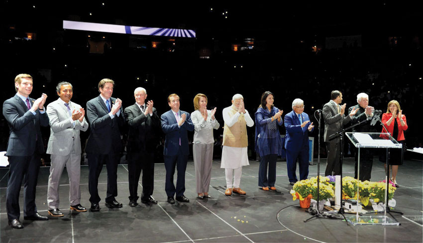 File photo of Prime Minister Narendra Modi greets the audience as top U.S. politicos cheer at SAP Center in San Jose, Calif., during the PM’s historic Silicon Valley visit in September, last year. (Press Trust of India)