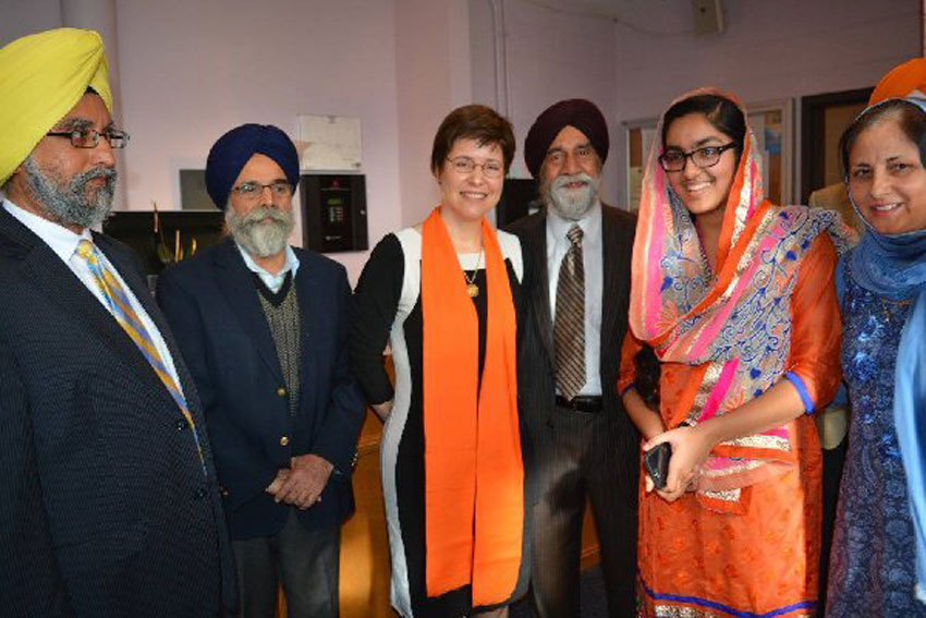Melissa Rogers (3rd from l) with members of the Sikh community. (Flora Video and Photo Productions) 