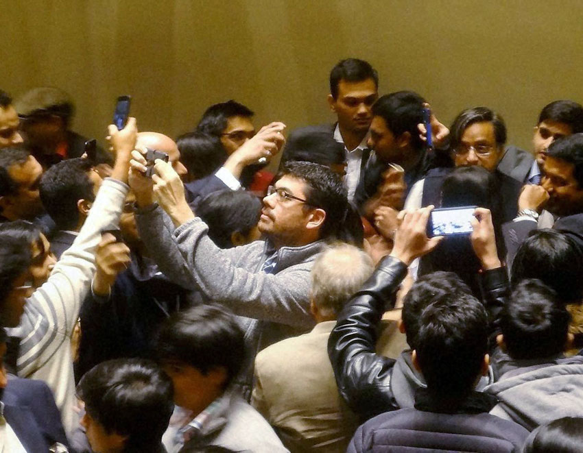 Indian students at Harvard Business School throng Shashi Tharoor for a selfie after he delivered a key note address at the Annual India Conference of Harvard University in Boston, Mass., Feb. 7. (Press Trust of India) 