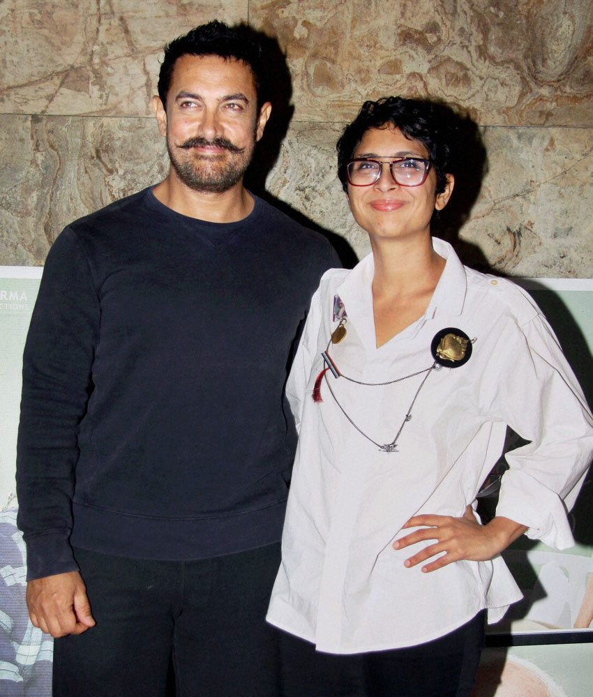 Aamir Khan with wife Kiran Rao at the screening of “Kapoor and Sons” in Mumbai, Mar. 15. (Press Trust of India) 