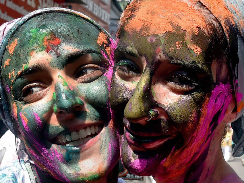 Tourists with color on their face, celebrating ‘Holi’ in Kolkata, Mar. 23. (Swapan Mahapatra | PTI) 