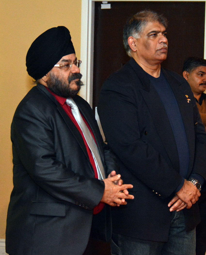 Indian American travel professionals Gurpreet Singh (l) and Sandeep Talwar listen to the presentation on Know India, at Amber in Los Altos, Calif., Mar. 7. (Amar D. Gupta | Siliconeer)