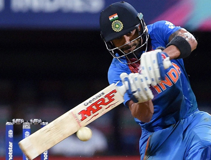 Indian batsman Virat Kohli plays a shot during the ICC T20 World cup semi final match against West Indies in Mumbai, Mar. 31. (Shashank Parade | PTI) 