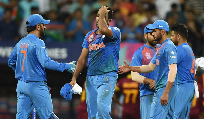 Indian players look dejected after they lost to West Indies the ICC T20 World cup semi final match in Mumbai, Mar. 31. (Shashank Parade | PTI) 