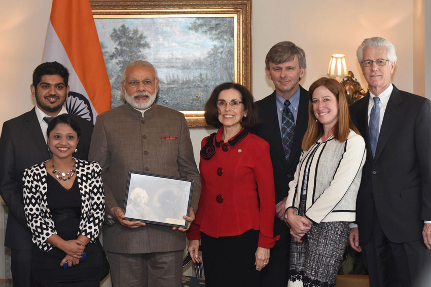Indian Prime Minister Narendra Modi poses with a group of scientists including some of Indian origin from Laser Interferometer Gravitational Wave Observatory (LIGO) after their bilateral meeting in Washington, D.C., Mar. 31. (Shirish Shete | PTI) 