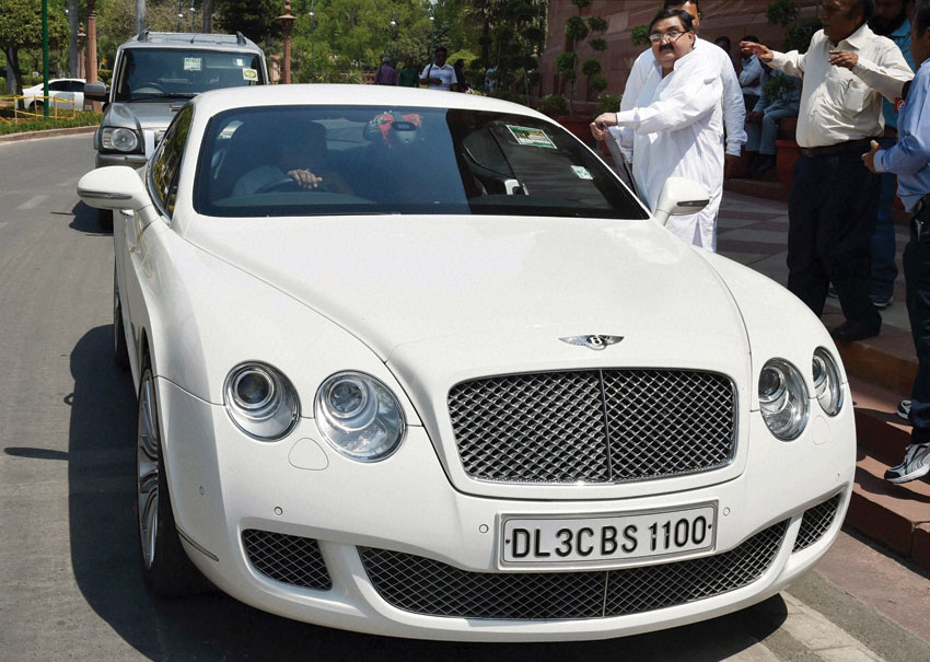 BJP MP Ashwani Kumar (Minna) violates the odd-even rule as he arrives at Parliament House with an even numbered car, in New Delhi, April 25. (Atul Yadav | PTI) 