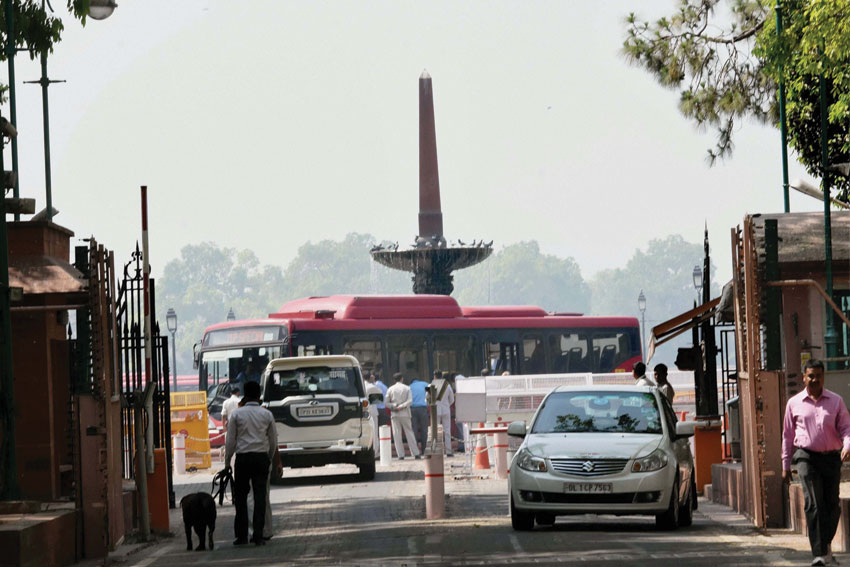 A MP Special DTC bus stationed at the main gate of Parliament in New Delhi, April 25. Six air-conditioned special buses were put in place by the Delhi government to ferry MPs to Parliament, as odd-even road rationing scheme was operational in the Indian capital. (Subhav Shukla | PTI) 