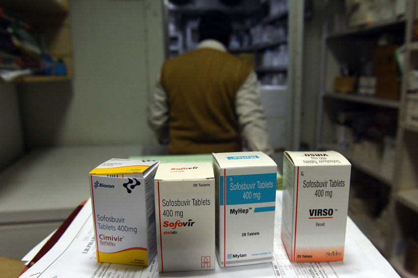 File photo showing Babu Bhai, an employee with a pharmacy, next to generic medicine in New Delhi. India earned a nickname as 'the pharmacy to the developing world' for its tough stance on patents. Successive governments have taken a view that patents should be granted only for major innovations, not updates to existing compounds -- allowing domestic manufacturers to make generic versions of drugs at vastly lower cost. (Prakash Singh | AFP | Getty Images) 