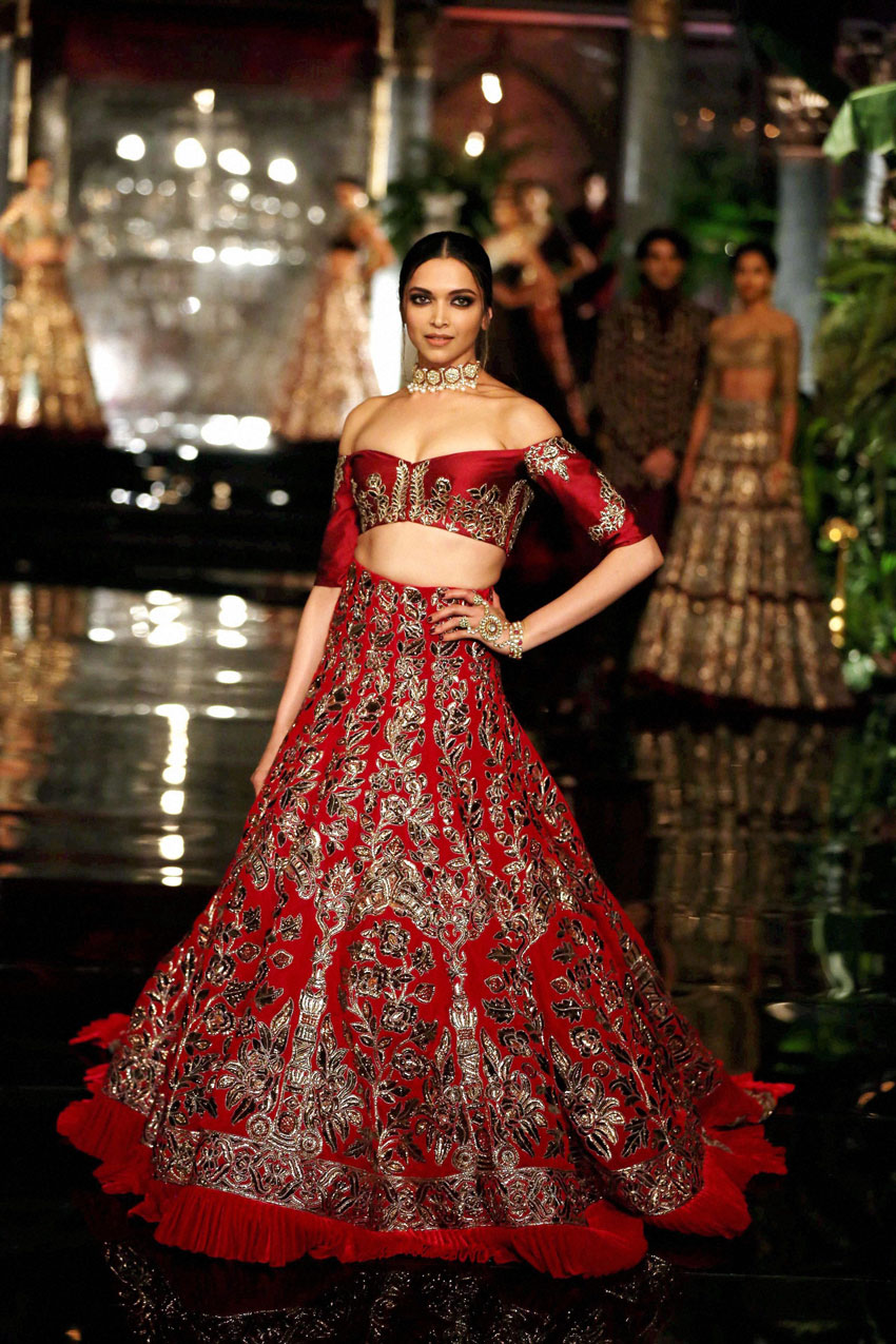Deepika Padukone walks on the ramp in designer Manish Malhotra's creation at the opening of India Couture Week 2016, in New Delhi, July 20. (Press Trust of India) 
