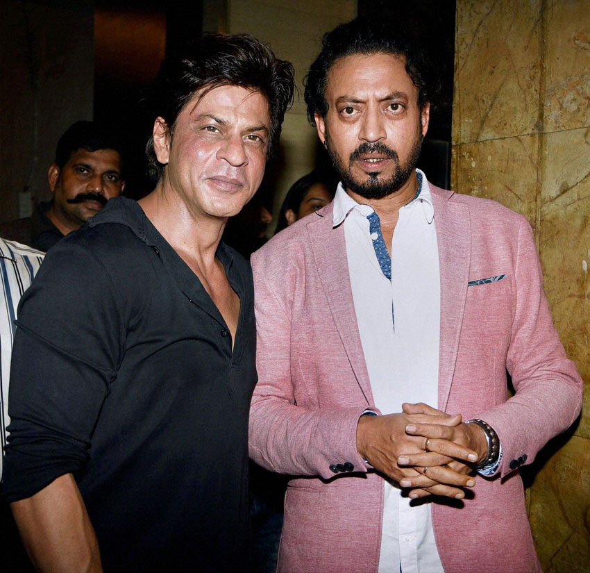Shah Rukh Khan poses with Irrfan Khan during the screening of film 'Madaari,' in Mumbai, July 20. (Press Trust of India)