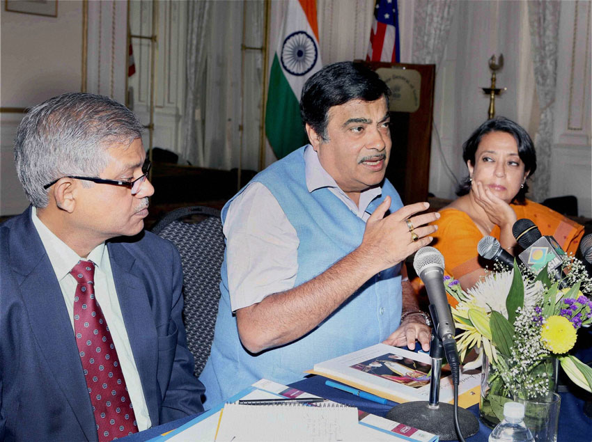 Indian Minister for Roads Transport Highways and Shipping, Nitin Gadkari, (c), flanked by Alok Srivastava, Addl Secretary Ministry of Shipping and Reeva Ganguly Das, Consul General of India in New York, at a press conference at the Indian Consulate, New York, July 13. (Press Trust of India)