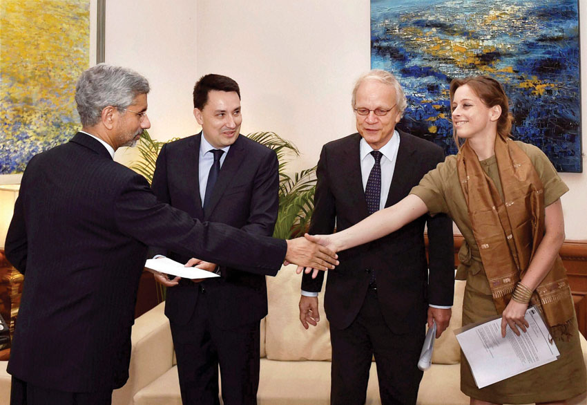 Foreign Secretary S. Jaishankar shakes hands with Luxembourg's Charge d Affaires, Laure Huberty after receiving Missile Technology Control Regime (MTCR) membership papers from France Ambassador-designate, Alexandre Ziegler, Netherlands Ambassador Alphonsus Stoelinga, in New Delhi, June 27. (Kamal Singh | PTI)