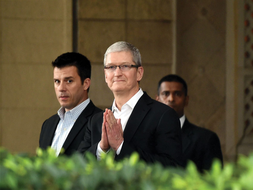 Apple CEO Tim Cook greets India on his maiden visit with a 'namaste' at the Taj Mahal Palace hotel in Mumbai, May 18. (Press Trust of India) 