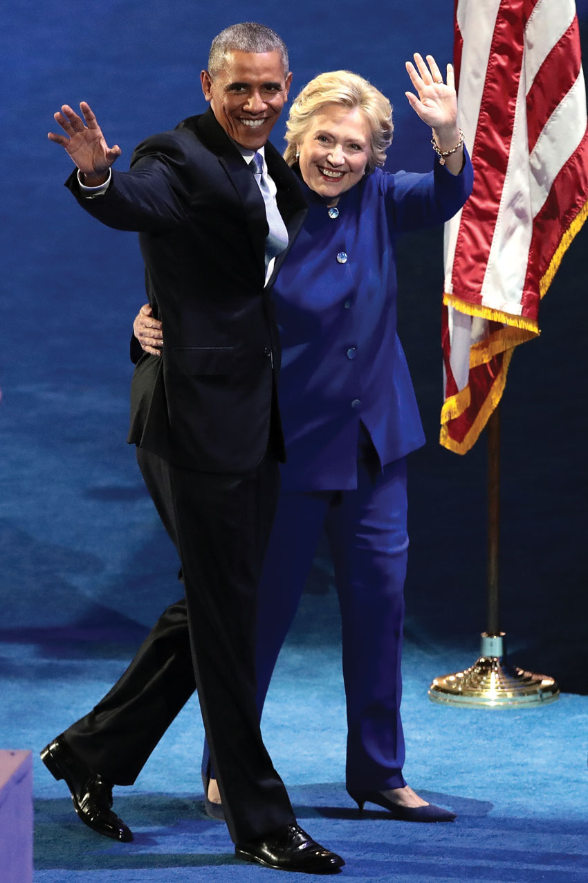 President Barack Obama and Democratic presidential nominee Hillary Clinton acknowledge the crowd on the third day of the Democratic National Convention at the Wells Fargo Center, July 27, in Philadelphia, Pennsylvania. (Drew Angerer | Getty Images) 