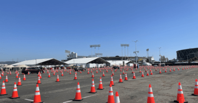 COVID-19 Vaccination site setup at the Oakland Coliseum. Impeccable crowd management makes the process easy and efficient. Total time for the vaccination took about 25 minutes. 10 minutes to go around the track and get vaccinated. The last 15 minutes is for observation.