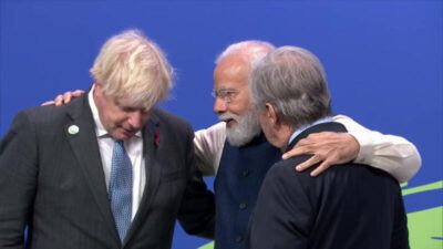 (Above): Indian Prime Minister Narendra Modi (c) being received by Prime Minister of United Kingdom Boris Johnson (l), and Secretary General of the United Nations Antonio Guterres at the Scottish Exhibition Center to attend the World Leaders Summit of COP26, in Glasgow, Scotland, Nov. 01. (PIB)