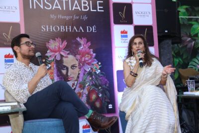 Aamir Khan and 'Insatiable' author, Shobhaa De, speak with guest at the book launch. (All Photos: Pallav Paliwal/APH Images)