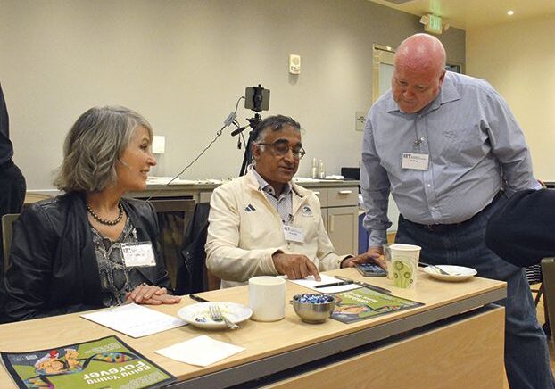 (Above, l-r) Stanford Educators Linda Oleson and Dr. Ronjon Nag interact with speaker Ian Nock. (Vansh A. Gupta/Siliconeer)