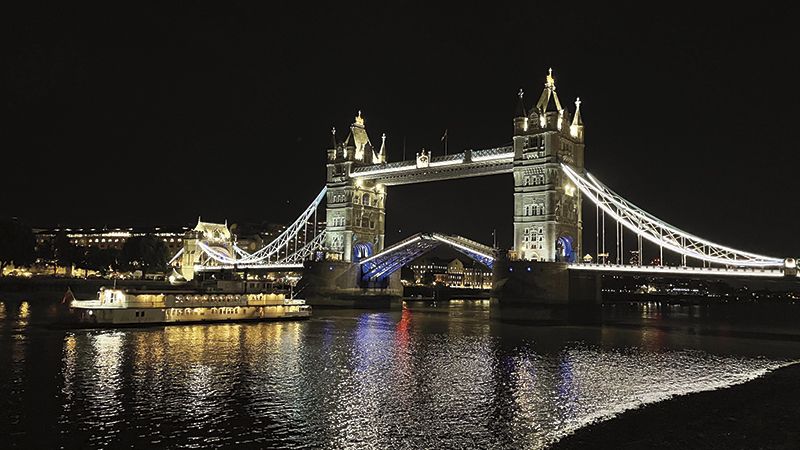 A night time shot of Tower Bridge located closer to the eastern side of London City